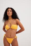 Jessica Haller x NA-KD Strukturerade bikinitrosor - Yellow