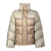 Sacai Down jacket with wide sleeve detail by Sacai. The brand has been...