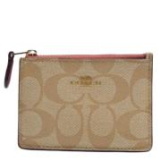 Coach Pre-owned Pre-owned Belagd canvas plnbcker Beige, Dam