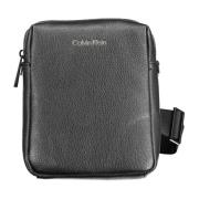 Calvin Klein Svart Polyester Axelväska med Justerbar Rem Black, Unisex