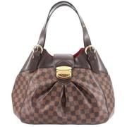 Louis Vuitton Vintage Pre-owned Canvas axelremsvskor Brown, Dam