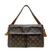 Louis Vuitton Vintage Pre-owned Canvas axelremsvskor Brown, Dam