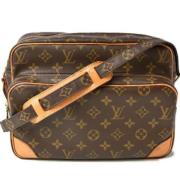 Louis Vuitton Vintage Pre-owned Canvas axelremsvskor Brown, Dam