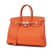 Hermès Vintage Pre-owned Laeder handvskor Orange, Dam