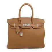 Hermès Vintage Pre-owned Laeder handvskor Brown, Dam