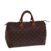 Louis Vuitton Vintage Pre-owned Canvas handvskor Brown, Dam