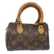 Louis Vuitton Vintage Pre-owned Canvas handvskor Brown, Dam