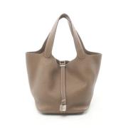 Hermès Vintage Pre-owned Laeder handvskor Beige, Dam