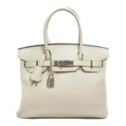 Hermès Vintage Pre-owned Laeder handvskor Beige, Dam