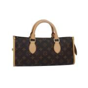 Louis Vuitton Vintage Pre-owned Canvas handvskor Brown, Dam