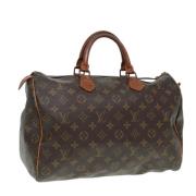 Louis Vuitton Vintage Pre-owned Canvas handvskor Brown, Dam