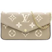 Louis Vuitton Vintage Pre-owned Tyg plnbcker Beige, Dam