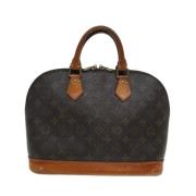 Louis Vuitton Vintage Pre-owned Canvas handvskor Brown, Dam