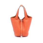 Hermès Vintage Pre-owned Laeder handvskor Orange, Dam