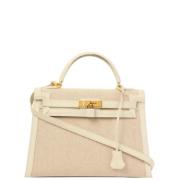 Hermès Vintage Pre-owned Canvas handvskor Beige, Dam