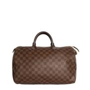 Louis Vuitton Vintage Pre-owned Canvas handvskor Brown, Dam