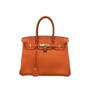 Hermès Vintage Pre-owned Laeder handvskor Orange, Dam