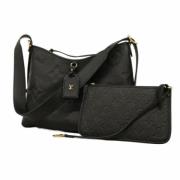 Louis Vuitton Vintage Pre-owned Tyg axelremsvskor Black, Dam