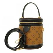 Louis Vuitton Vintage Pre-owned Tyg handvskor Brown, Dam