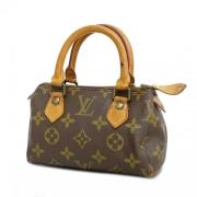 Louis Vuitton Vintage Pre-owned Tyg handvskor Brown, Dam