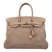 Hermès Vintage Pre-owned Laeder handvskor Beige, Dam