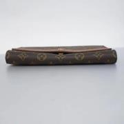 Louis Vuitton Vintage Pre-owned Tyg kuvertvskor Brown, Dam