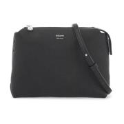 Khaite Hamrad läderclutch med expanderbara sidor Black, Dam