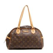 Louis Vuitton Vintage Pre-owned Canvas axelremsvskor Brown, Dam