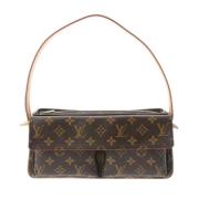 Louis Vuitton Vintage Pre-owned Canvas axelremsvskor Brown, Dam