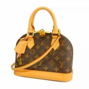 Louis Vuitton Vintage Pre-owned Tyg handvskor Brown, Dam