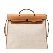 Hermès Vintage Pre-owned Canvas handvskor Beige, Dam