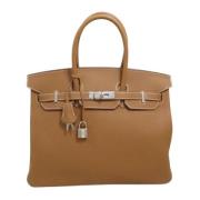 Hermès Vintage Pre-owned Laeder handvskor Brown, Dam