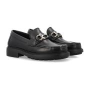 Salvatore Ferragamo Gyllene spännen sneakers Black, Herr