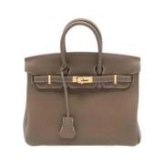 Hermès Vintage Pre-owned Laeder handvskor Beige, Dam