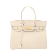 Hermès Vintage Pre-owned Laeder handvskor Beige, Dam