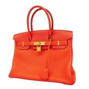 Hermès Vintage Pre-owned Laeder handvskor Orange, Dam