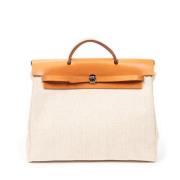 Hermès Vintage Pre-owned Canvas handvskor Beige, Dam