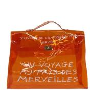 Hermès Vintage Pre-owned Vinyl handvskor Orange, Dam