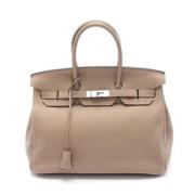 Hermès Vintage Pre-owned Laeder handvskor Beige, Dam