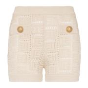 Balmain Monogramstickade minishorts med öppet arbete Beige, Dam