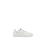 Axel Arigato Perforerade lädersneakers med broderad patch White, Herr