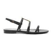 Saint Laurent Platta sandaler med guldtonad logodetalj Black, Dam