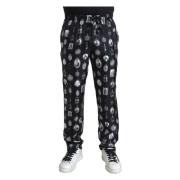 Dolce & Gabbana Elegant silkejoggers med religiöst tryck Black, Herr