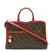 Louis Vuitton Vintage Pre-owned Canvas totevskor Red, Dam