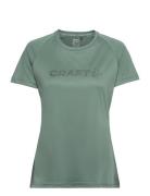 Core Unify Logo Tee W Sport T-shirts & Tops Short-sleeved Green Craft