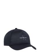 Calvin Klein Mono Logo Print Cap Svart