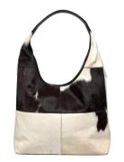 RE:DESIGNED EST 2003 Jia Big Svart