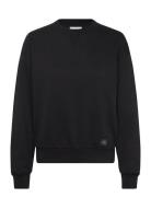 Calvin Klein Jeans A- Ls Badge Logo Terry Crew Nk Svart